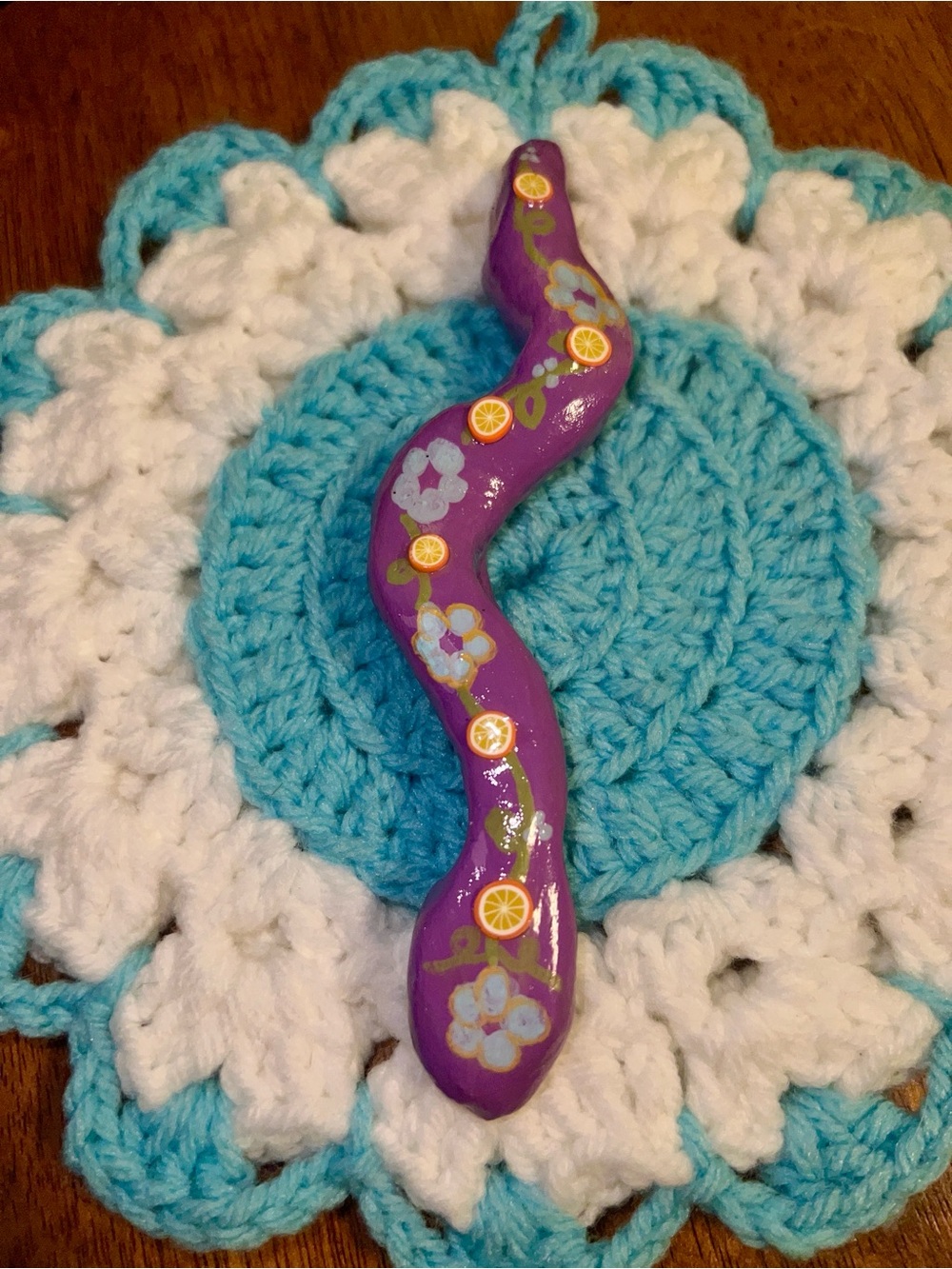 Purple Handcrafted snake garden ornament with Citrus Embellishments